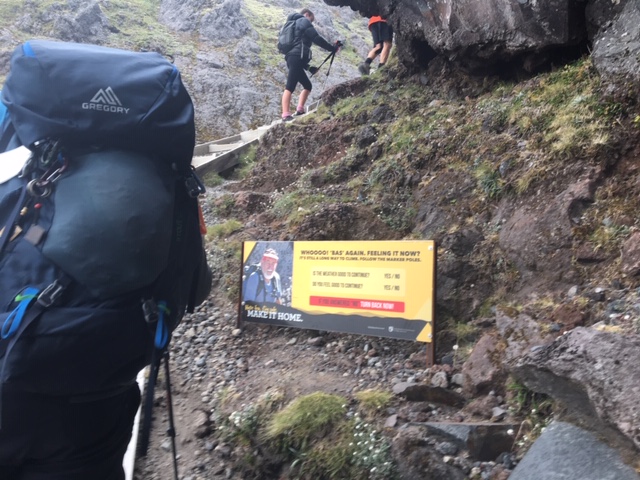 Signpost leading up to the stairs, helpful for climbing Mt Taranaki