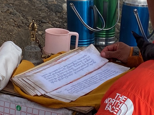 Tibetan prayers at the puja