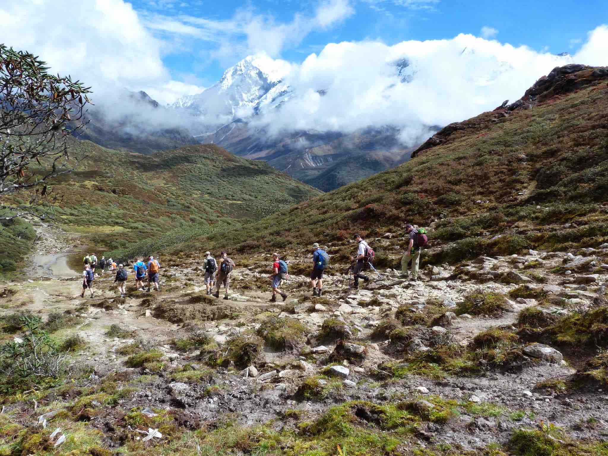 Trek team in a straight line